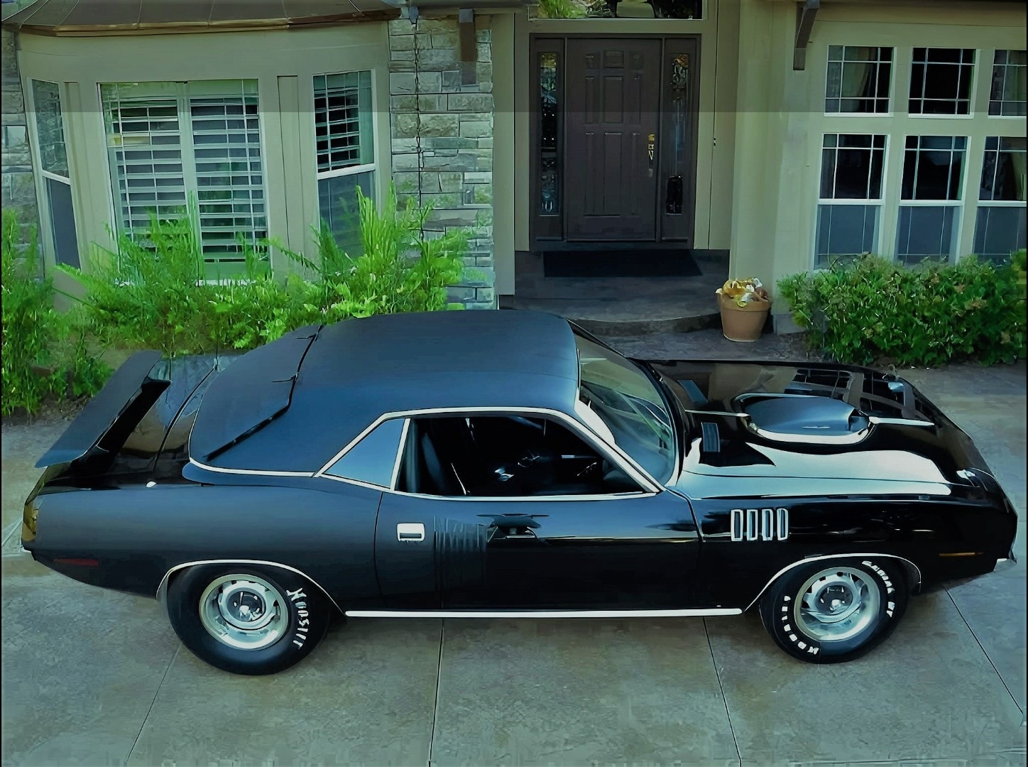 Don Almeido's 1971 Triple Black TX9 426 HemiCuda — full side profile with shaker hood
