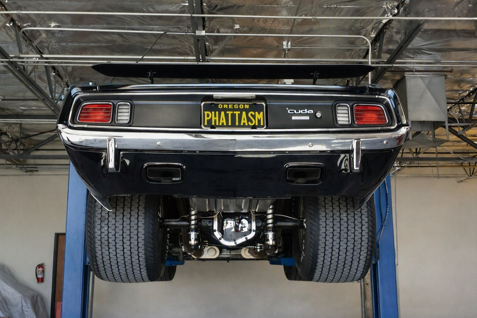 PHATTASM Oregon-plated 'Cuda on a lift — undercarriage and rear view