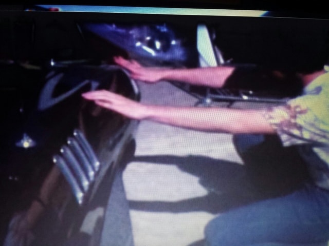 Hand on Cuda fender — on-set detail, Phantasm I 1979 production