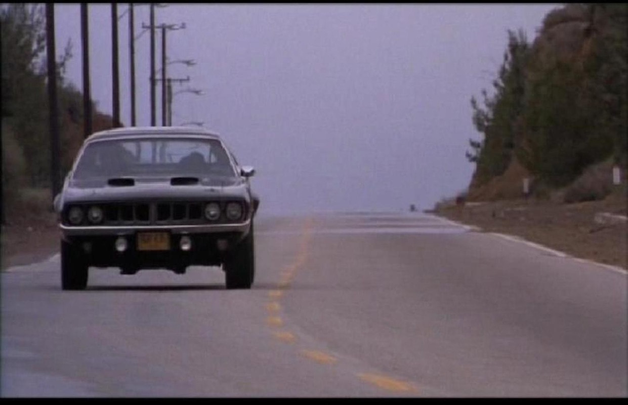 Phantasm Cuda driving down Kanan Road — front-on production still