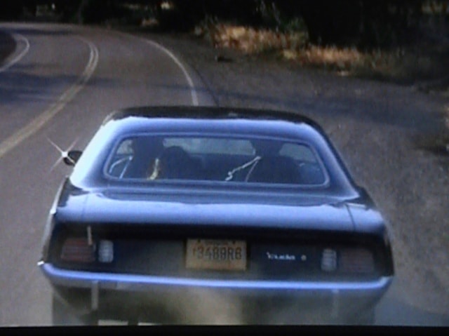 Phantasm Cuda rear view — parked on a curved road, production still