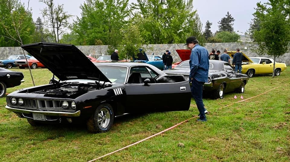 Don Coscarelli entering the Phantasm II movie Cuda at a car show