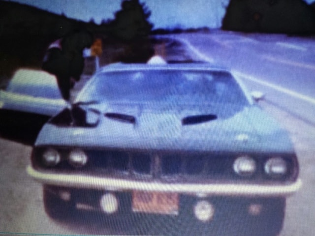 Kanan Road — Phantasm I Cuda front-on, production crew in background