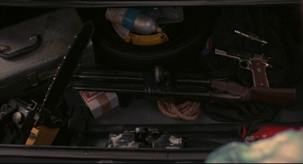 Ravager Survival Truck weapons — the battle-ready arsenal stowed in the trunk of the Battle-Cuda. Rifles, pistols, rope, and survival gear packed for the apocalypse.