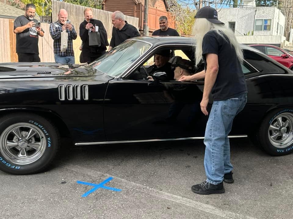 Reggie Bannister and Bill Thornbury with the Phantasm II movie Cuda at a fan event