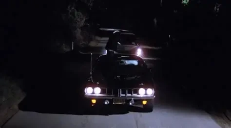 The original Phantasm 1971 Cuda driving at night with its distinctive sunroof