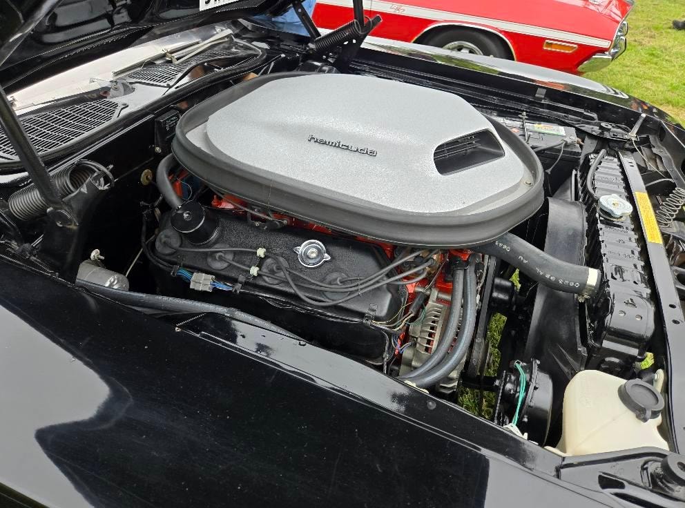 The 426 Hemi engine of the Phantasm III HemiCuda convertible with Shaker bubble and Argent Silver finish