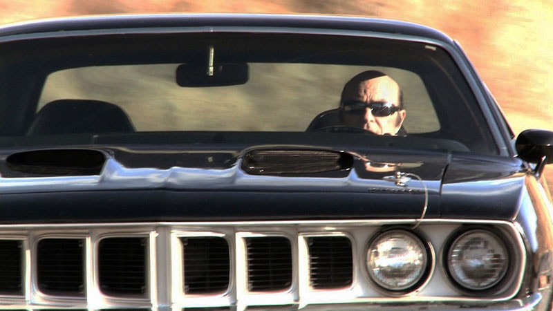 Don Coscarelli behind the wheel of the Battle-Cuda during Phantasm: Ravager production