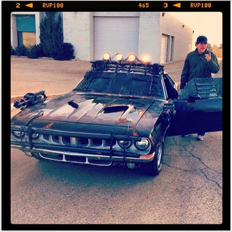 The Ravager battle Cuda with roof-mounted lights and protective equipment